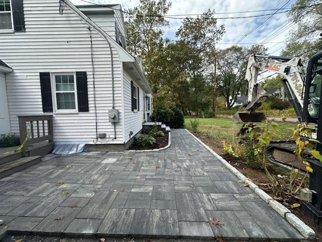 Project Elegant Stone Path Installation Transforms Home Entryway image