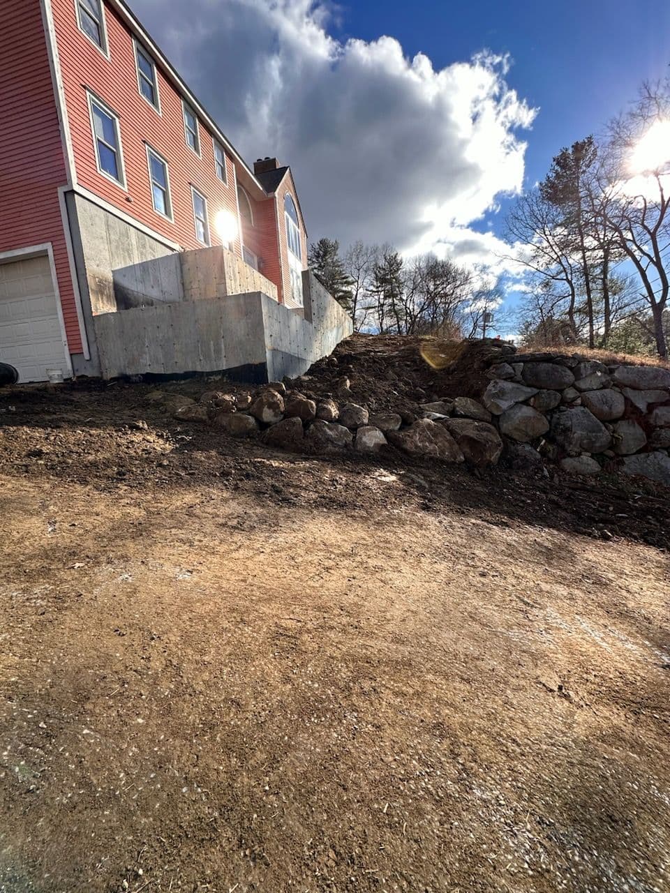 Concrete and Stone Retaining Wall Installation